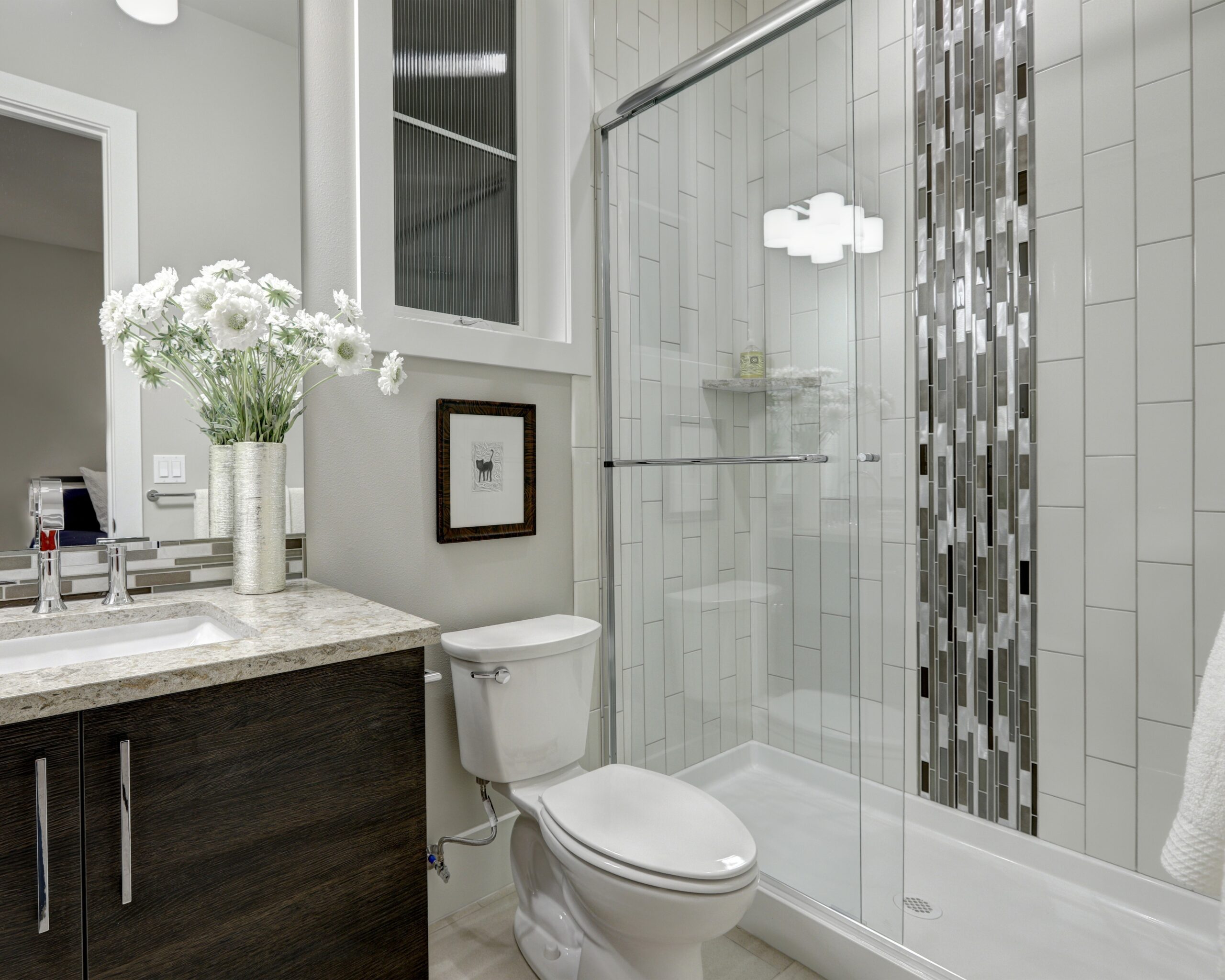 Glass walk-in shower in a bathroom of luxury home | Coastal Floors | Coastal Floors
